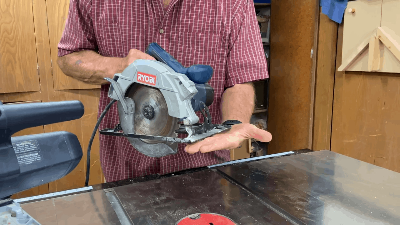Man holding a circular saw