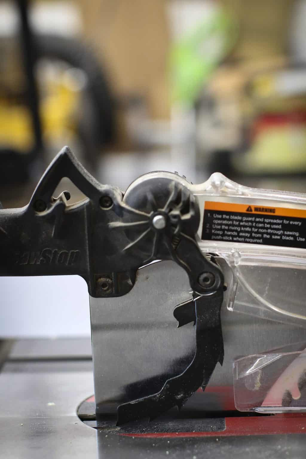 Why Is My Table Saw Stopping in Wood? SawsHub