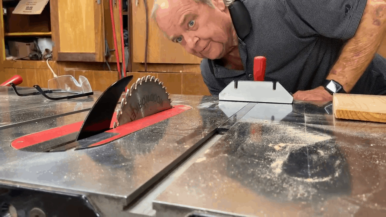 Man trying to check why his table saw wont start
