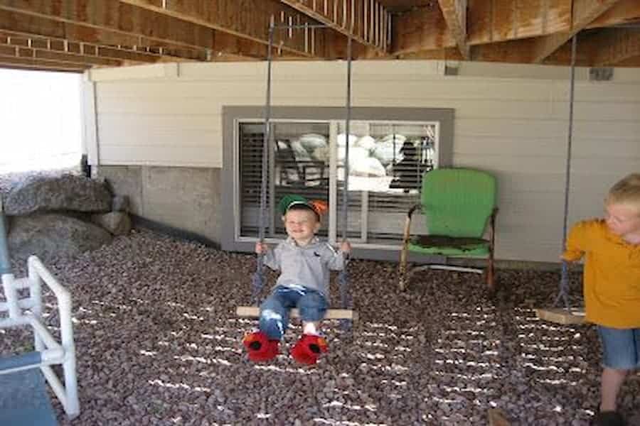 Under deck ideas with swings